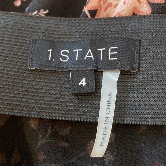 1 STATE floral skirt. Black background with tan gold and orange. Back zip 4
C - Picture 6 of 8